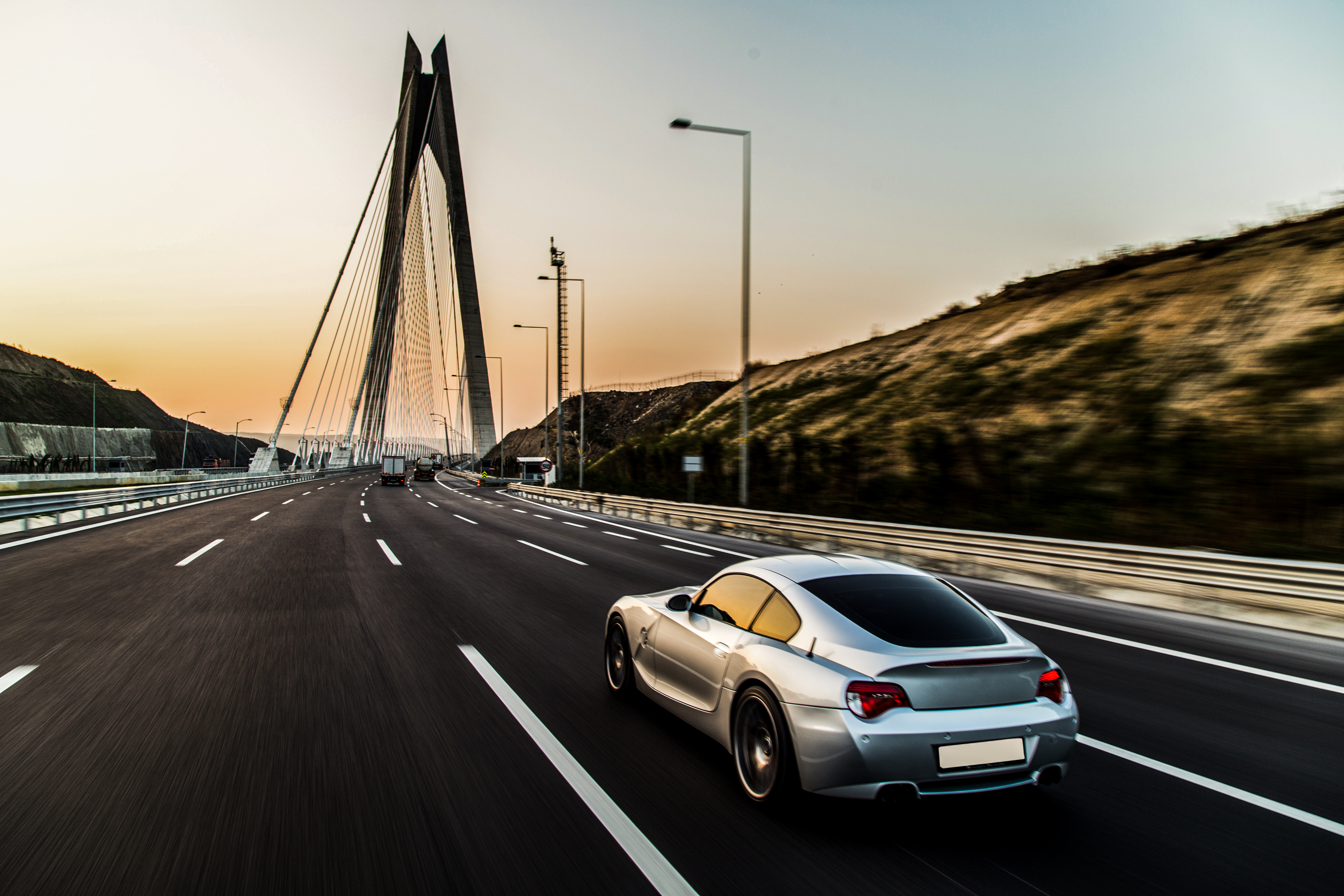 Desert highway with car